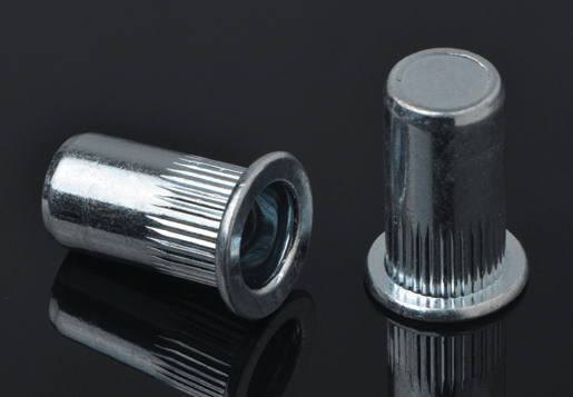 Bakal flat head knurled body rivet nut closed end type