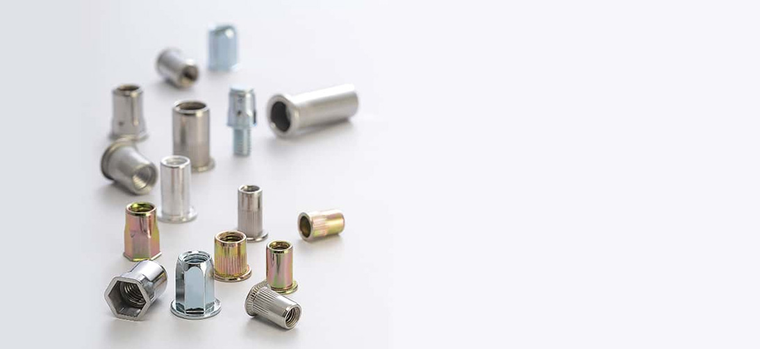 Flat head round body rivet nut